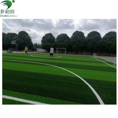 Tiles de césped artificial amarillo verde rojo para jardines de fútbol y pisos deportivos